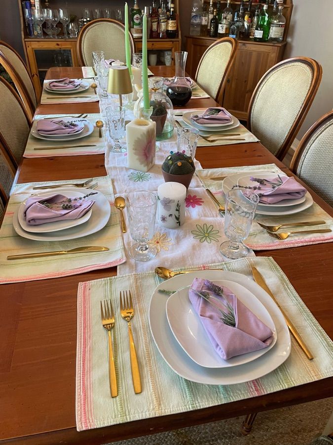 Intimate table setting with pink linens, gold flatware, and candlelight — Sienne's Table patio dinners, Lomita CA